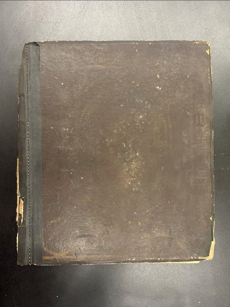 C053 heavily rubbed original brown publisher-issued front board