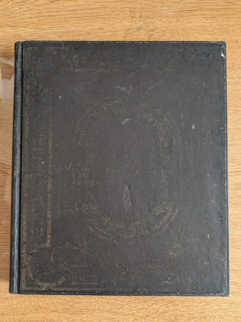C070 original brown paper-covered publisher-issued front board with faded gold decoration