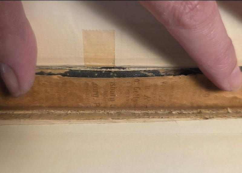 C073 newspaper fragment used as rebacking lining, mentioning Gettysburg and Virginia