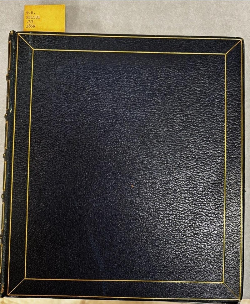 C074 later dark leather front board with shelfmark slip
