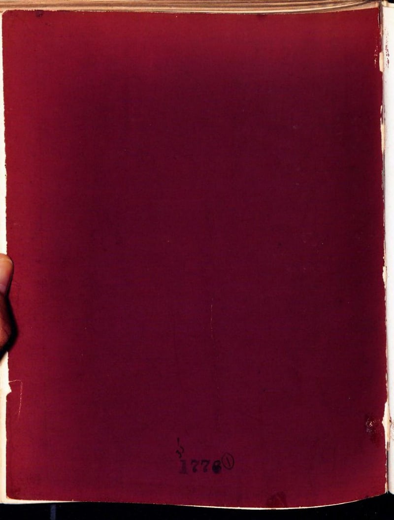 C084 maroon interior leaf with stamped number 17760