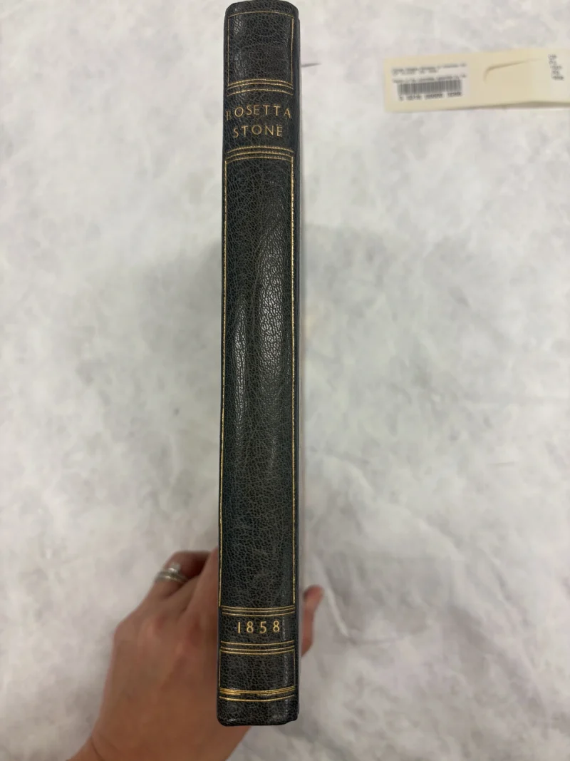 C089: Gilt title, date 1858, and rules