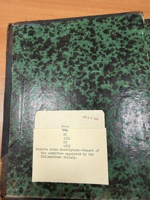 C058 Rear board with green marbled paper and catalog card reading PJ 1531 R3 1858, stamped JAN 26 1978
