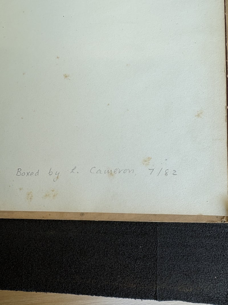 C061: Note recording L. Cameron's protective box, July 1982