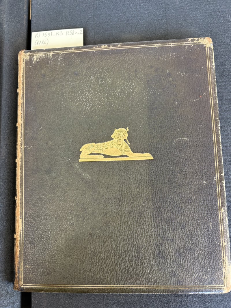 C062 later dark leather binding with gilt sphinx