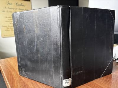 C055 later black buckram-tape library binding